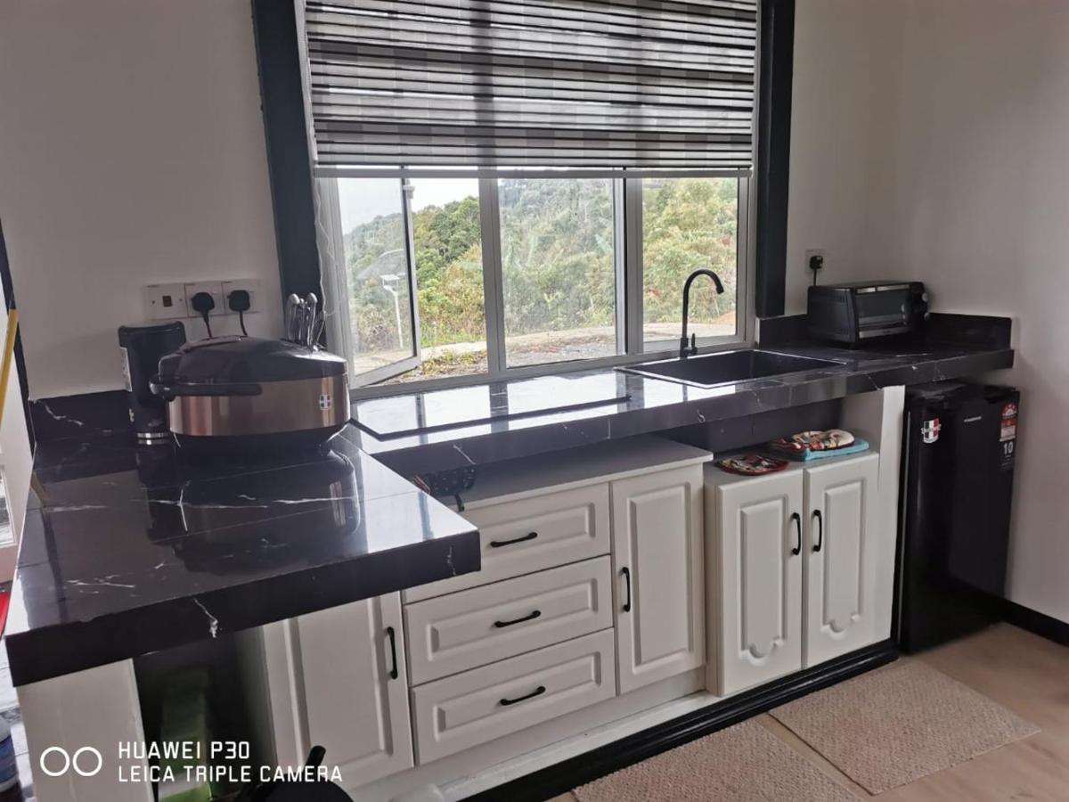 Hounon White Chimney Cottage Ranau Bagian luar foto